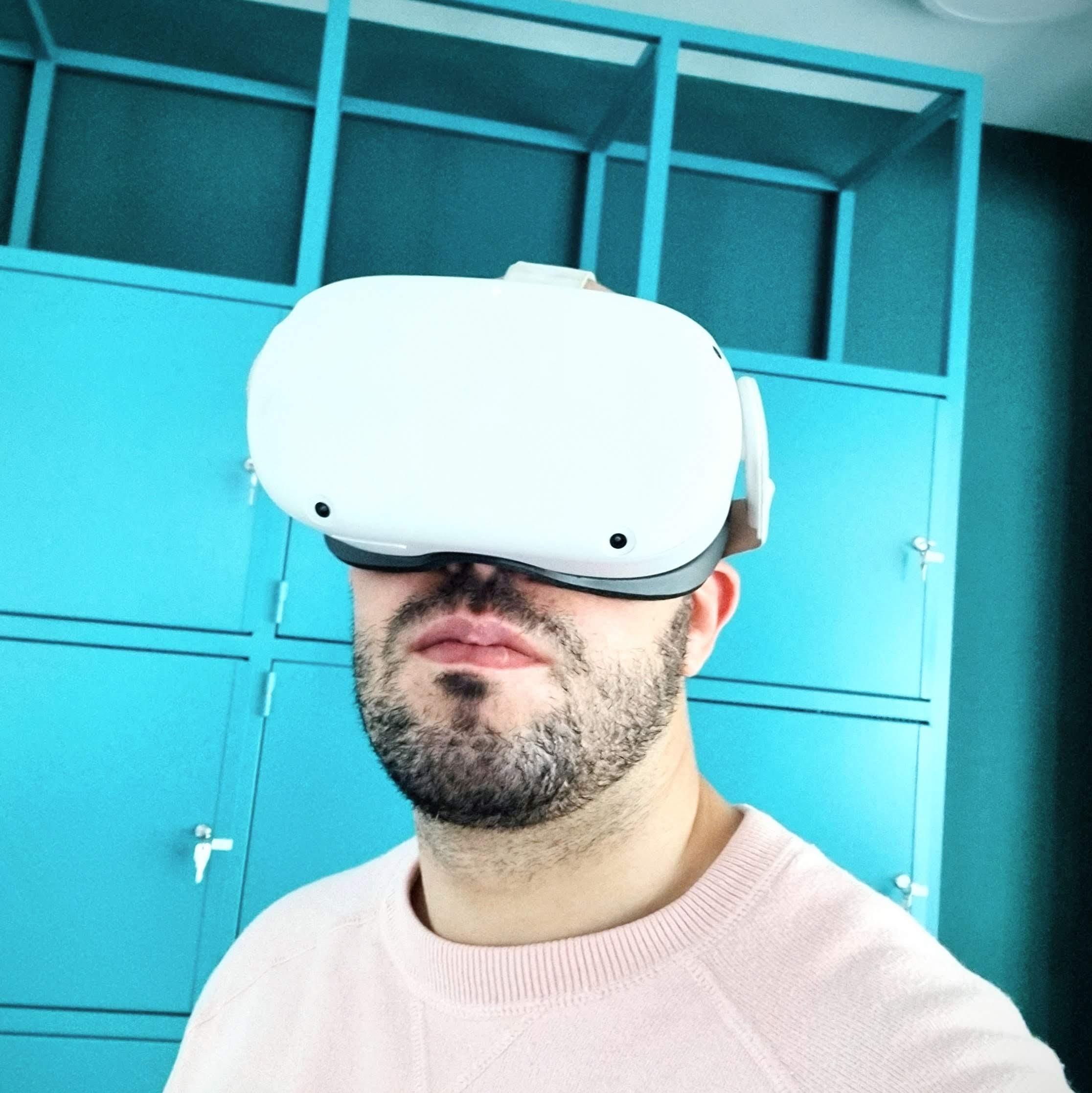 Ait Oufkir Yassine wearing a VR headset while designing a factory in virtual reality